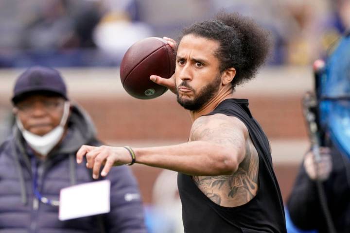 Quarterback Colin Kaepernick throws during halftime of an NCAA college football intrasquad spri ...