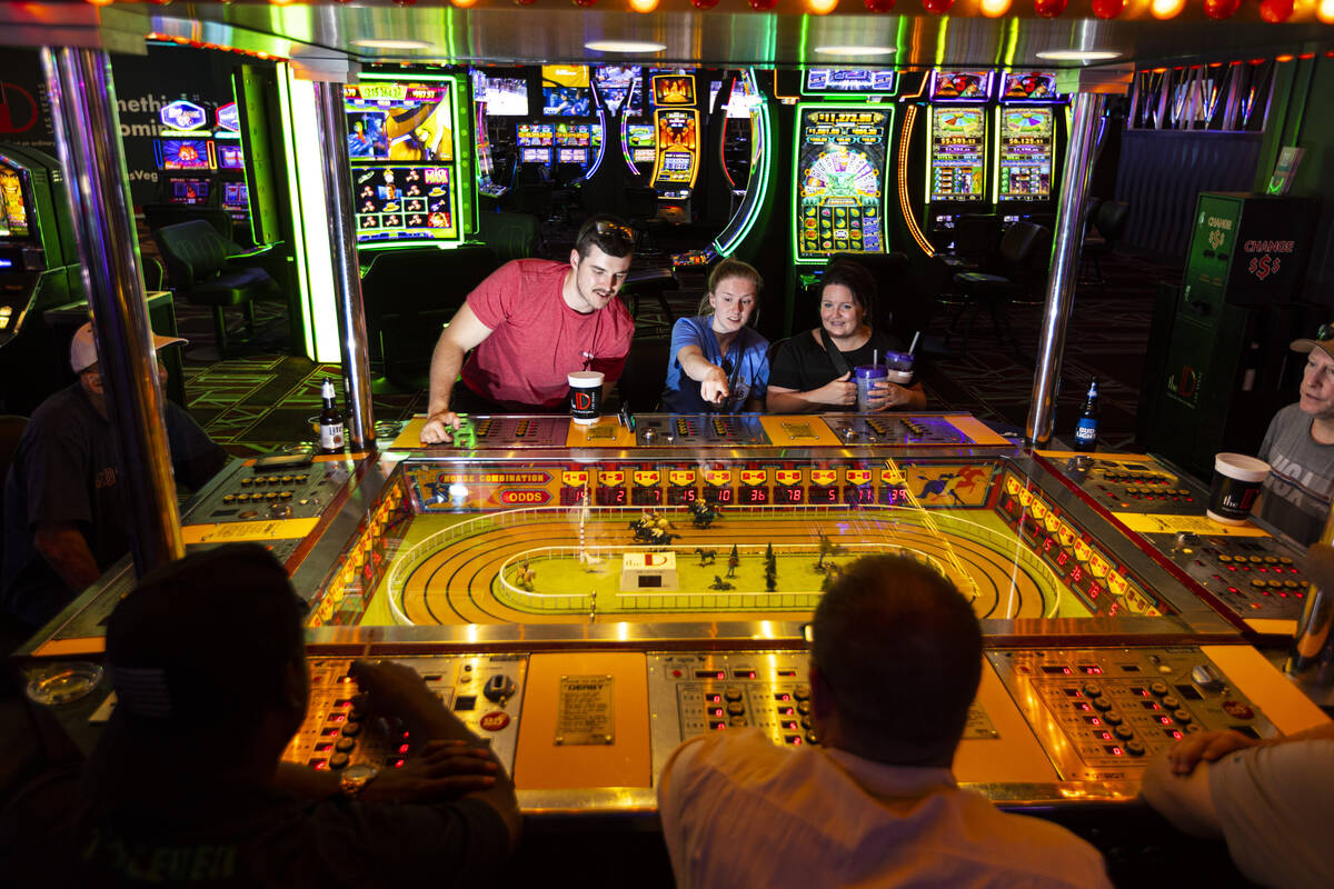 Reece Simpson, from left, Abbi Simpson, and Michelle Schleusner, all of Madison, S.D., play the ...