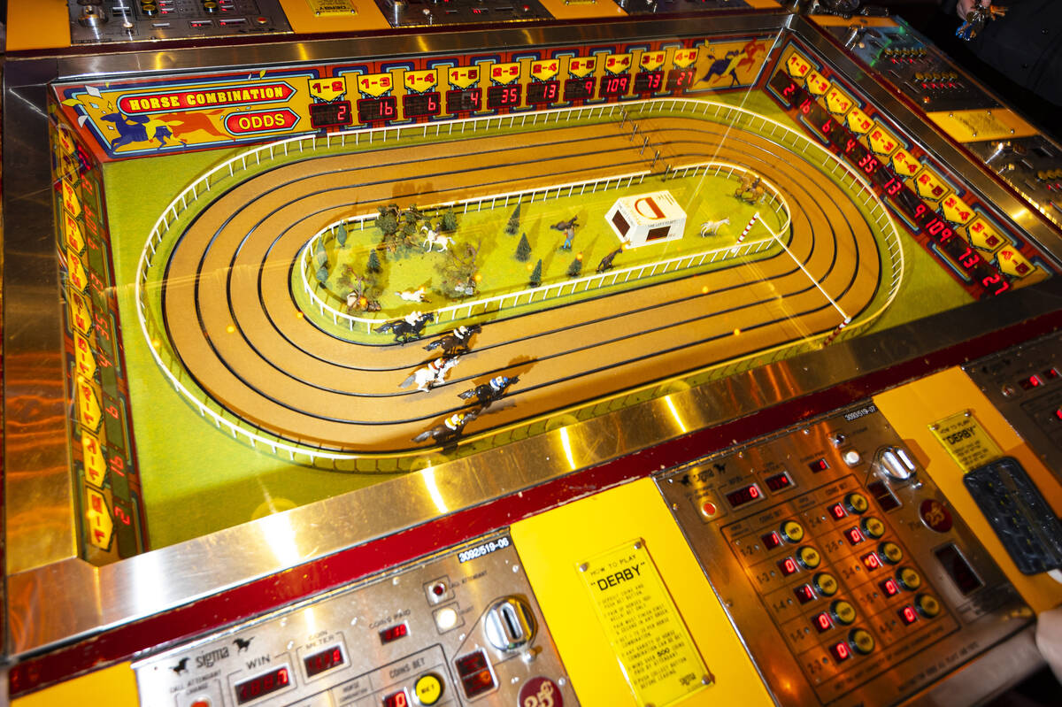 People play the coin-operated Sigma Derby game at the D Las Vegas on Tuesday, May 24, 2022, in ...