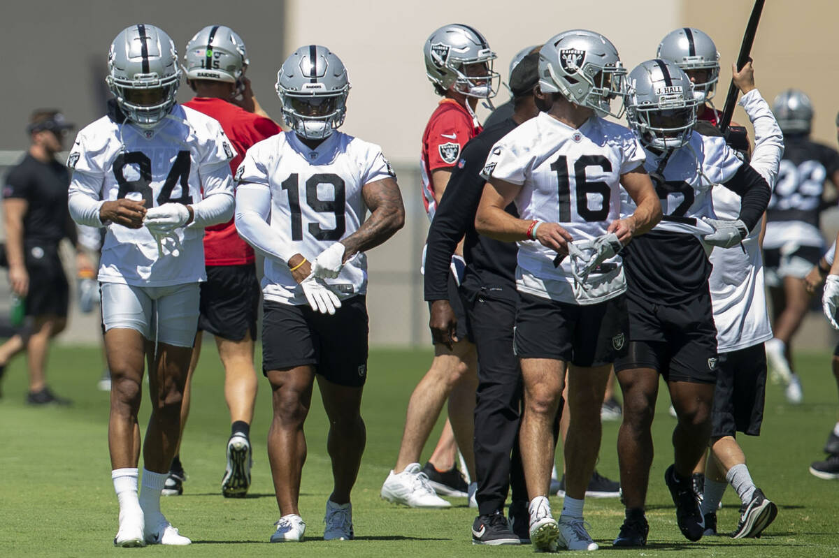 Raiders wide receivers Tyron Johnson (84), DJ Turner (19) and Dillon Stoner (16) during practic ...