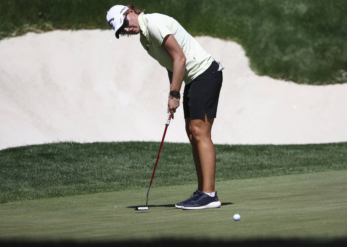 Perrine Delacour putts at the ninth hole during the second day of round-robin in the Bank of Ho ...