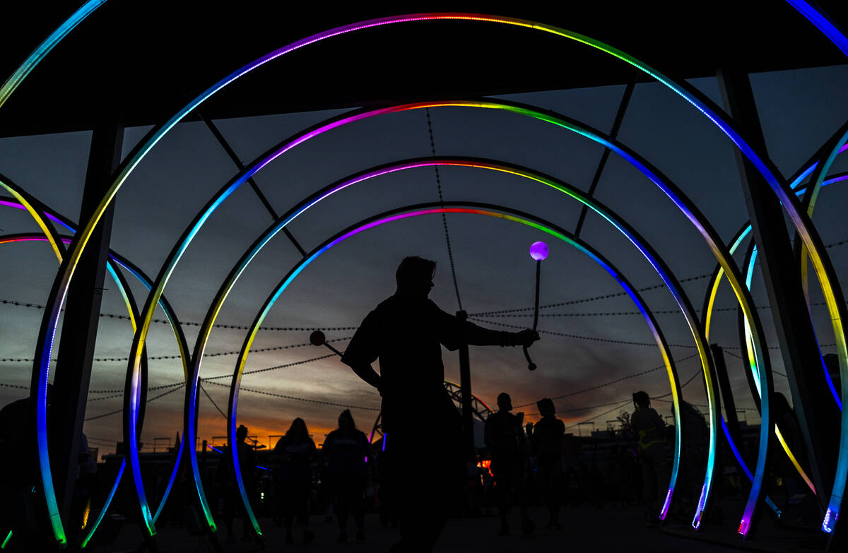 William Purdy, from Santa Clarita, Calif., performs with glowing balls during day three of Elec ...