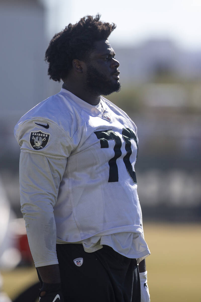 Raiders guard Alex Leatherwood (70) looks on during practice at Raiders headquarters at the Int ...
