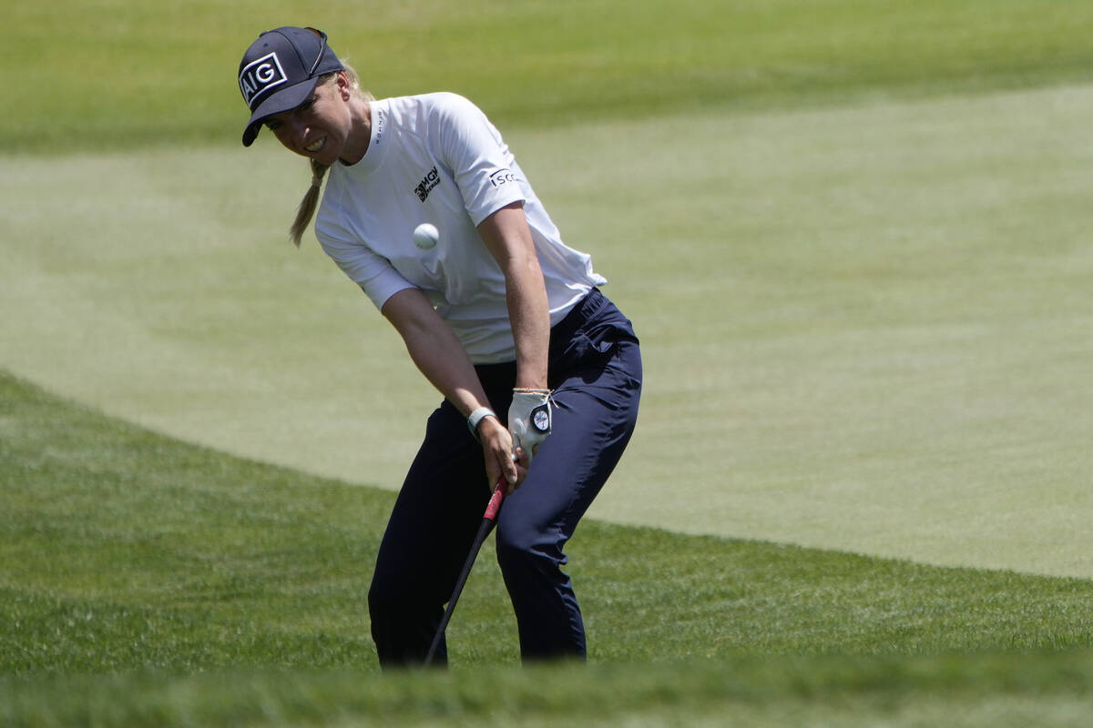 Sophia Popov chips onto the sixth green during the third day of round-robin play in the LPGA Ba ...