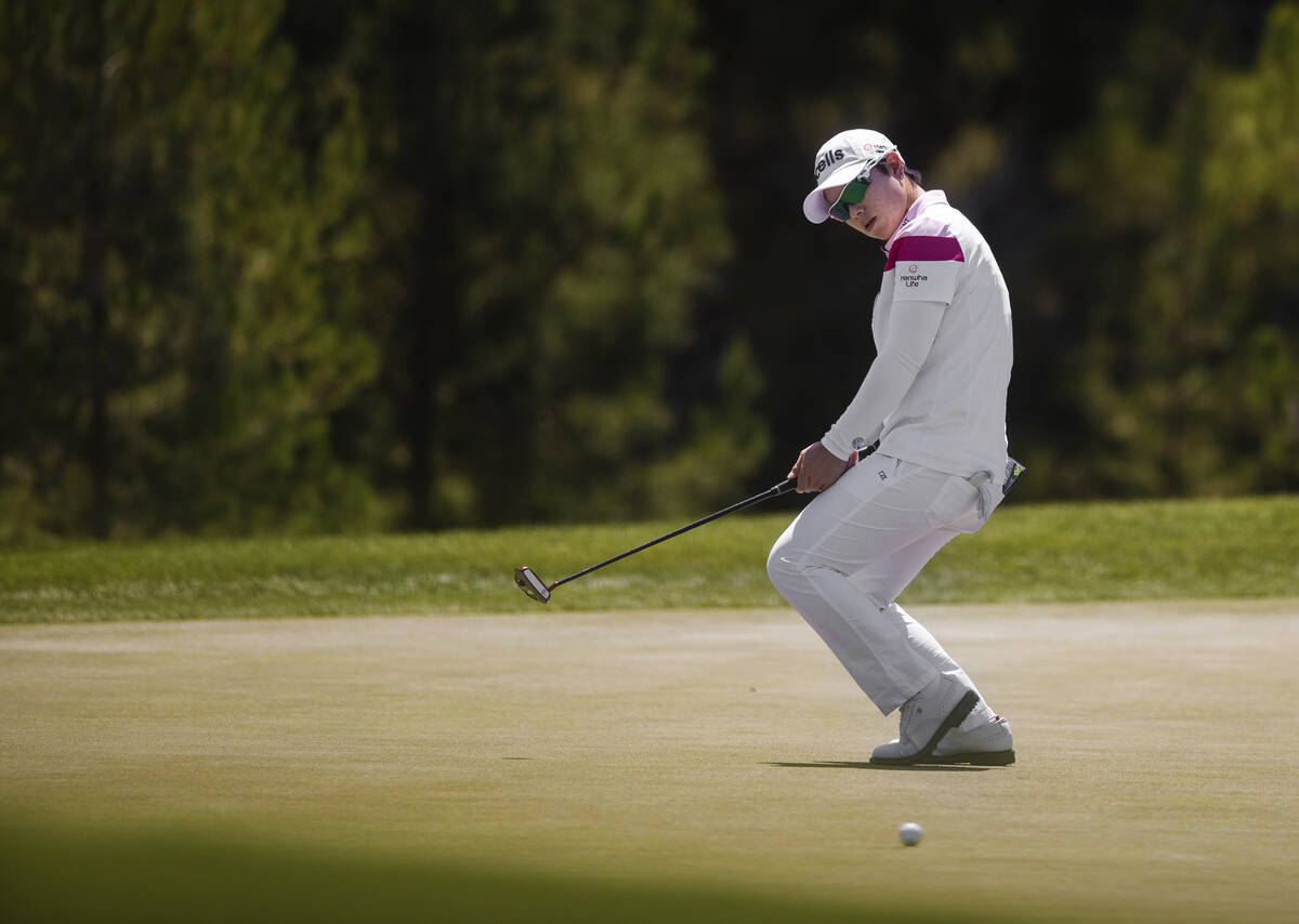 Eun-Hee Ji tries to will a put in on the 5th hole during the fourth day of the LPGA Bank of Hop ...