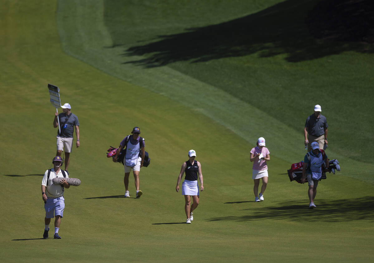 Lilia Vu, third from right, and Jodi Ewart Shadoff walk the fairway of the 6th hole during the ...
