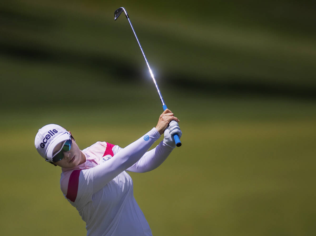 Eun-Hee Ji shoots from the fairway of the 4th hole during the fourth day of the LPGA Bank of Ho ...