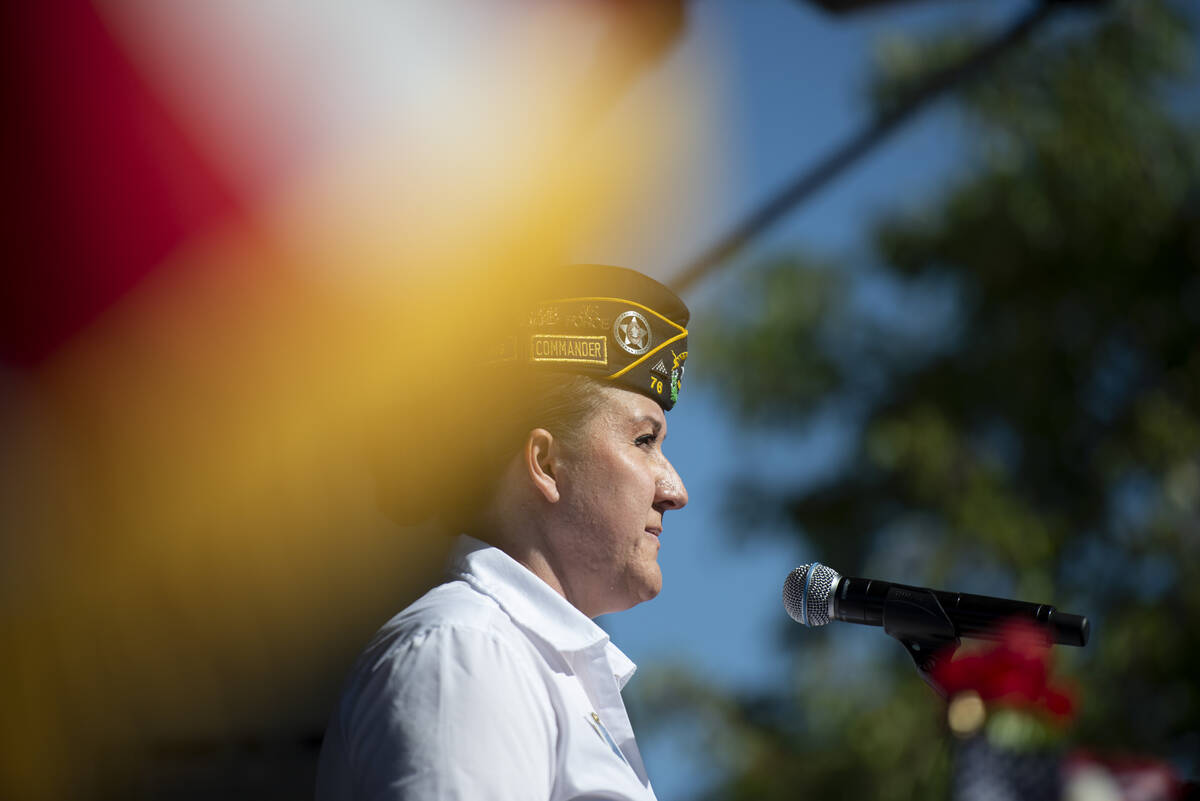 Pranava Moody, commander of American Legion Post 76, speaks to the crowd at Lake Sahara South P ...