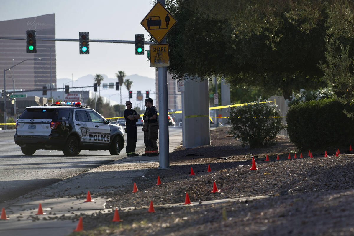 Metropolitan police and Las Vegas Fire investigate the scene where one person died after a vehi ...