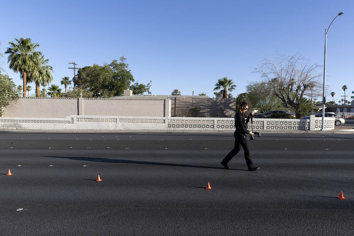 Metropolitan police investigate a single-vehicle wreck where one person died near East Desert I ...
