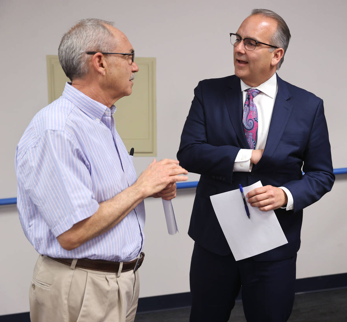 Clark County School District Superintendent Jesus Jara, right, speaks with John Vellardita, exe ...