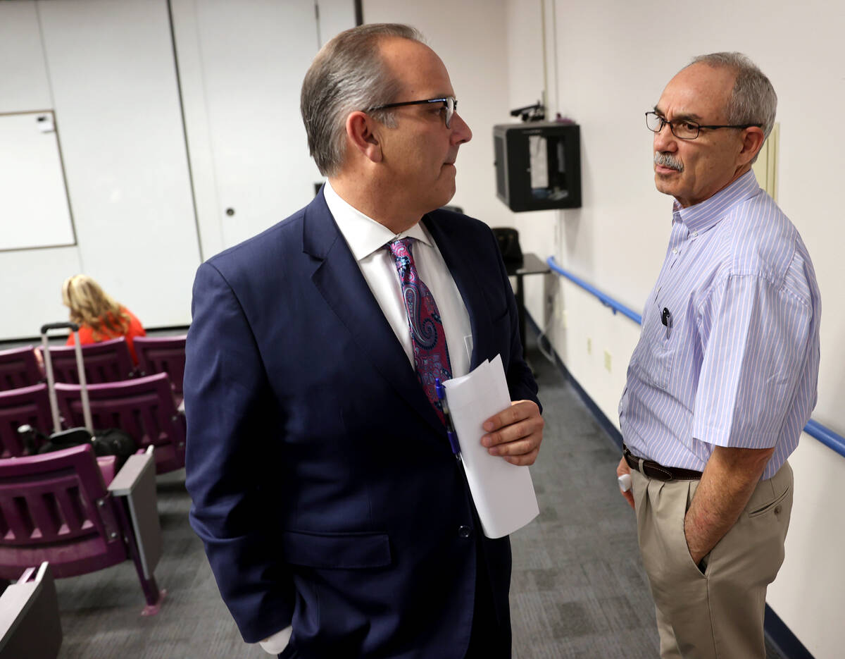 Clark County School District Superintendent Jesus Jara, left, speaks with John Vellardita, exec ...