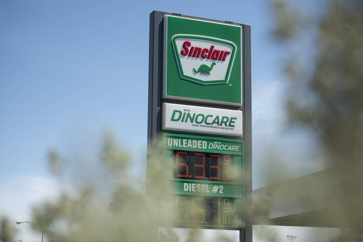 A sign at a Sinclair station on Dean Martin Drive reflects the recent rise in gas prices on Thu ...