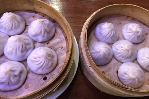 At Xiao Long Dumplings in the Chinatown Plaza, soup dumplings await diners who slurp out their ...