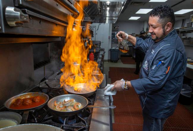 Il Toro Y La Capra executive chef Jose Martinez prepares Pasta al Cognac at the restaurant dedi ...