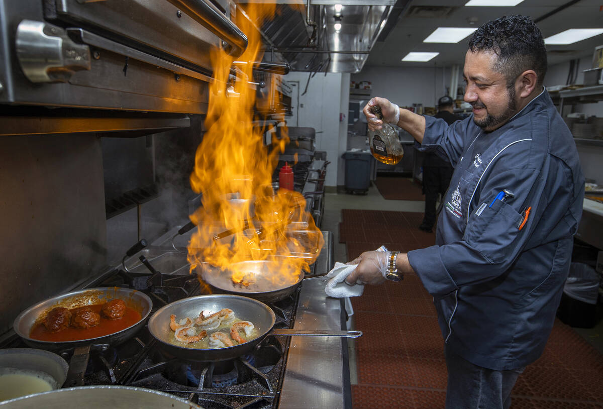 Il Toro Y La Capra executive chef Jose Martinez prepares Pasta al Cognac at the restaurant dedi ...
