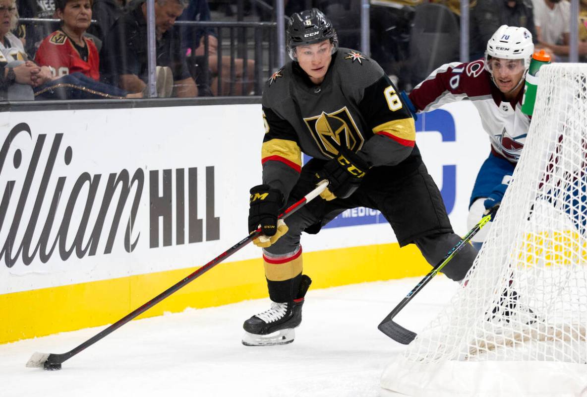 Golden Knights defenseman Kaedan Korczak (6) gains control of the puck followed by Avalanche ri ...