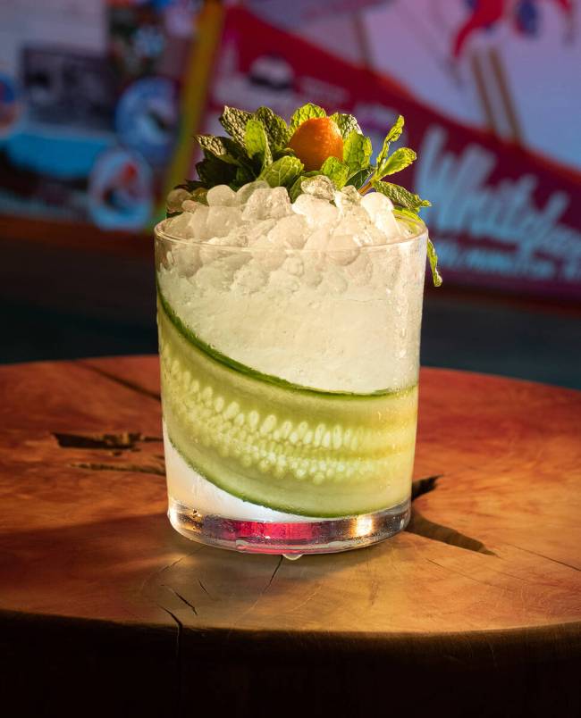 Signature “slopeside sips” include the Southside Snowplow, a citrusy gin cocktail served in ...