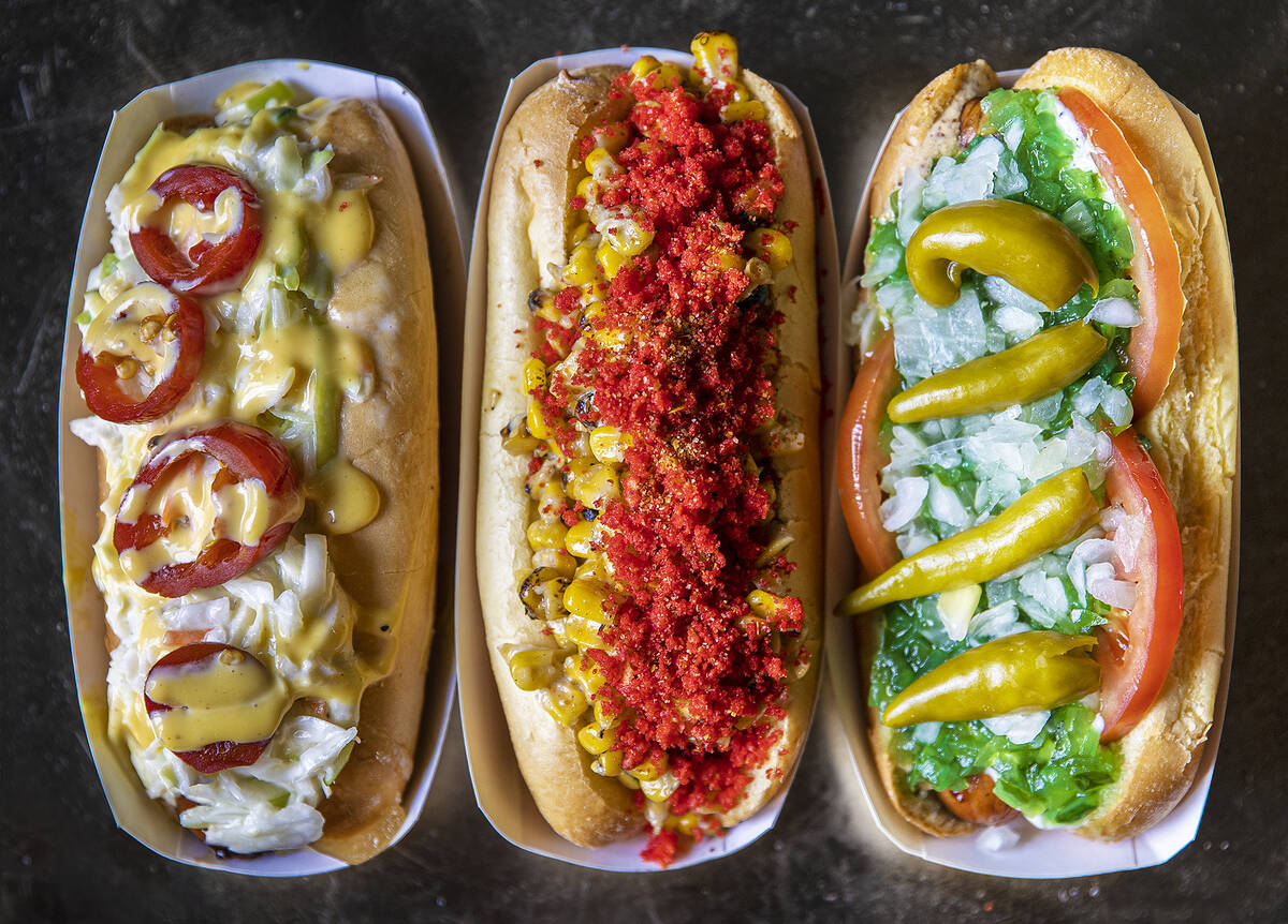 Aviator ale brat, left, elote street dog and the 312 dog at Las Vegas Ballpark on Sunday, May 1 ...