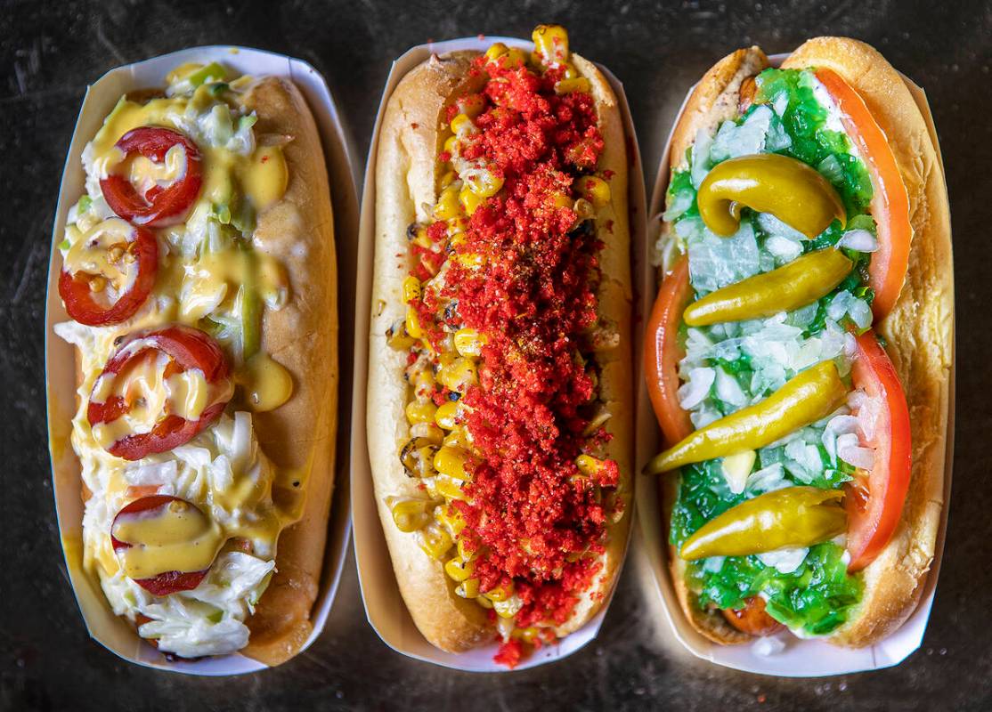 Aviator ale brat, left, elote street dog and the 312 dog at Las Vegas Ballpark on Sunday, May 1 ...