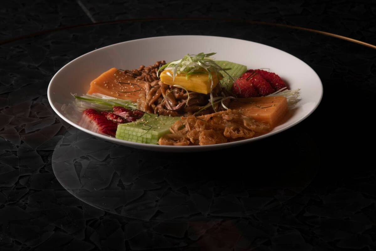 A Salad of Duck and Chef's Selection of Fresh Fruit at Red Plate, a Chinese restaurant in the C ...