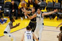 Golden State Warriors guard Stephen Curry, with ball, passes during the second half in Game 5 o ...