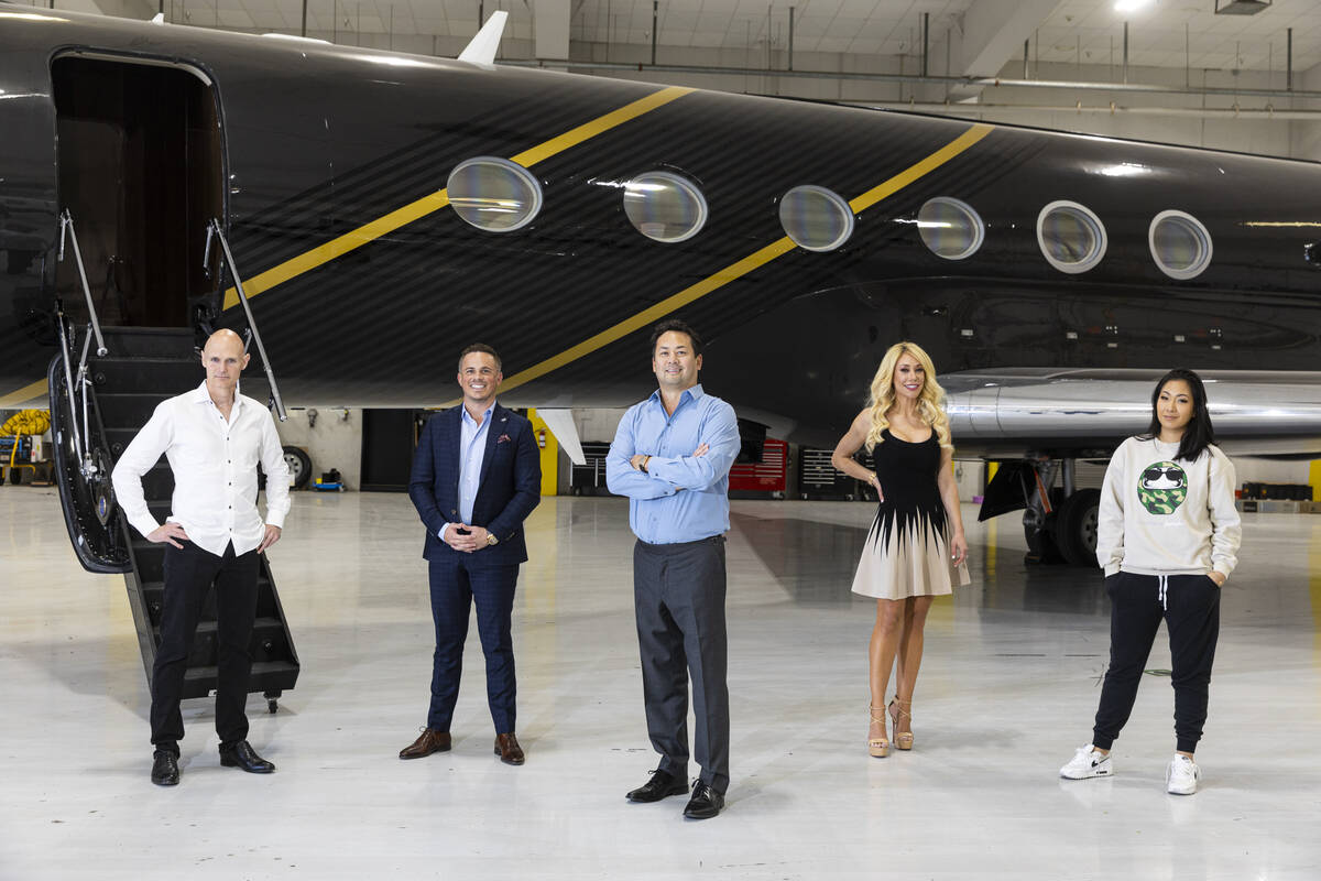 Members of the Las Vegas Justice League, from left, Greg Woods, CEO of Cirrus Aviation Services ...