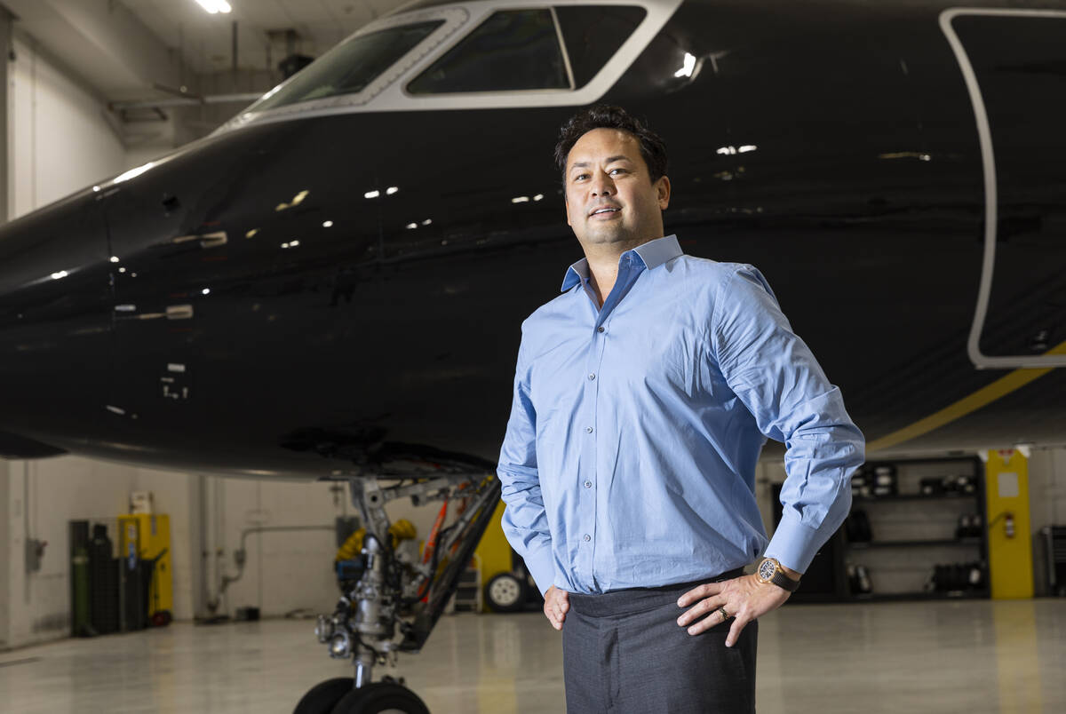 Las Vegas Justice League founder Justin Woo poses for a portrait at Cirrus Aviation Services on ...