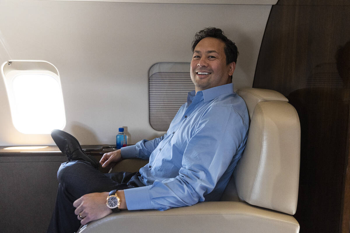 Las Vegas Justice League founder Justin Woo sits in a private jet at Cirrus Aviation Services o ...