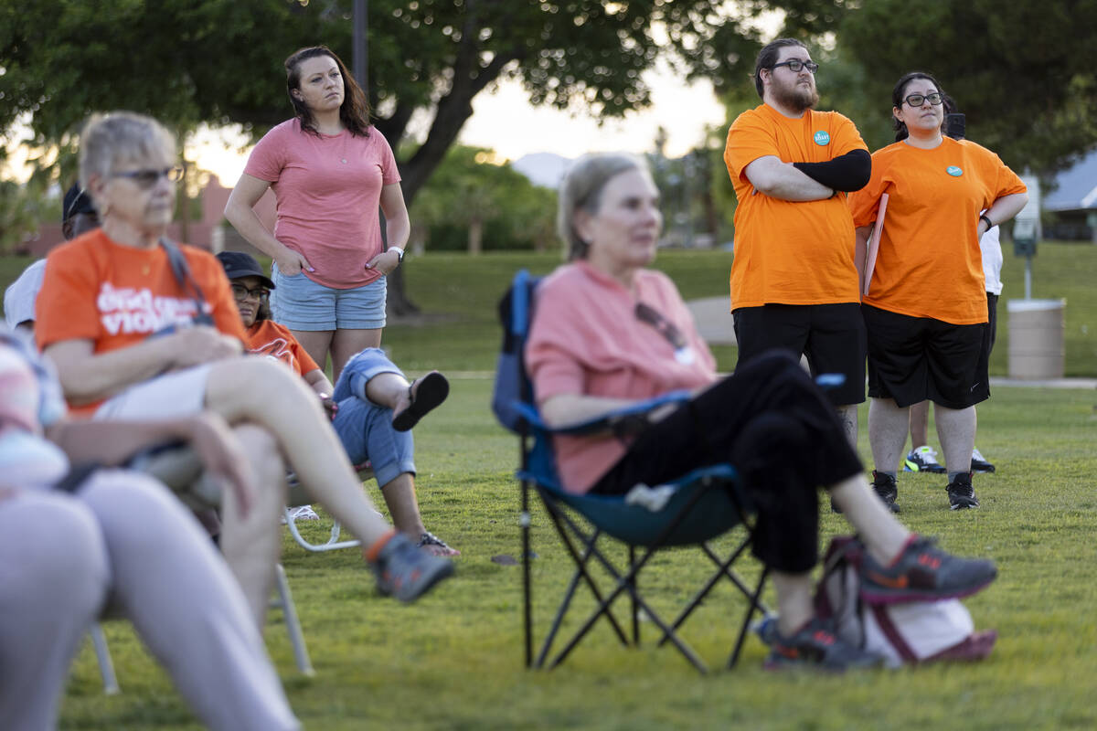 People attend the "Wear Orange" event hosted by gun safety advocates in protest of gu ...