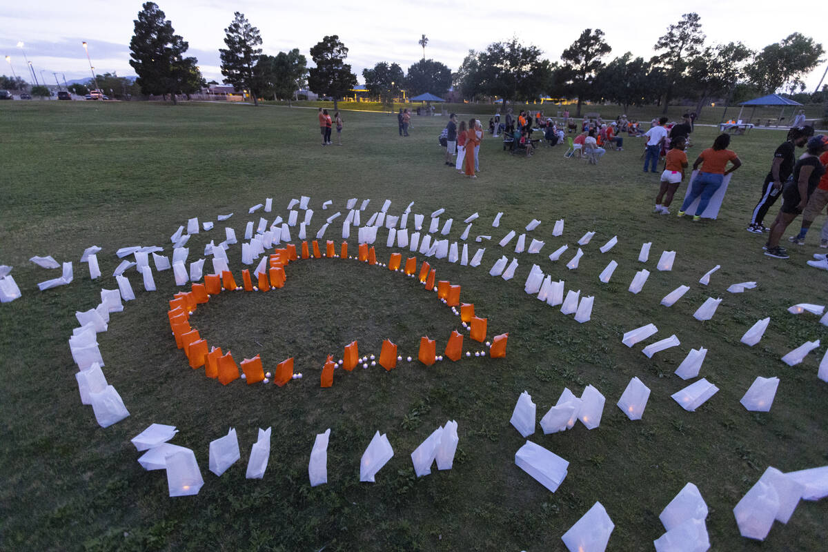 People attend the "Wear Orange" event hosted by gun safety advocates in protest of gu ...