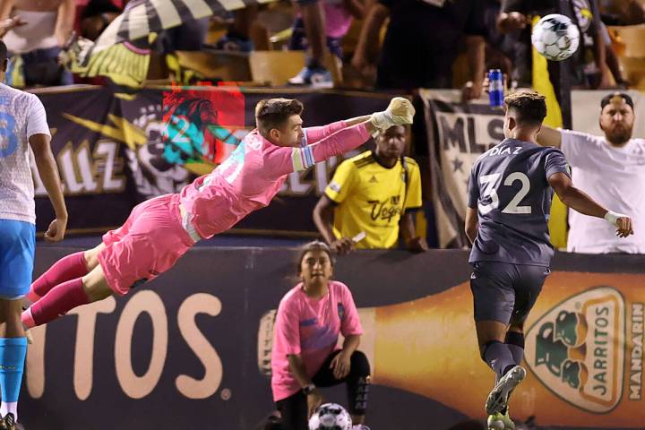 In this June 5, 2021, file photo, Las Vegas Lights goalkeeper Tomas Romero (30) clears the ball ...