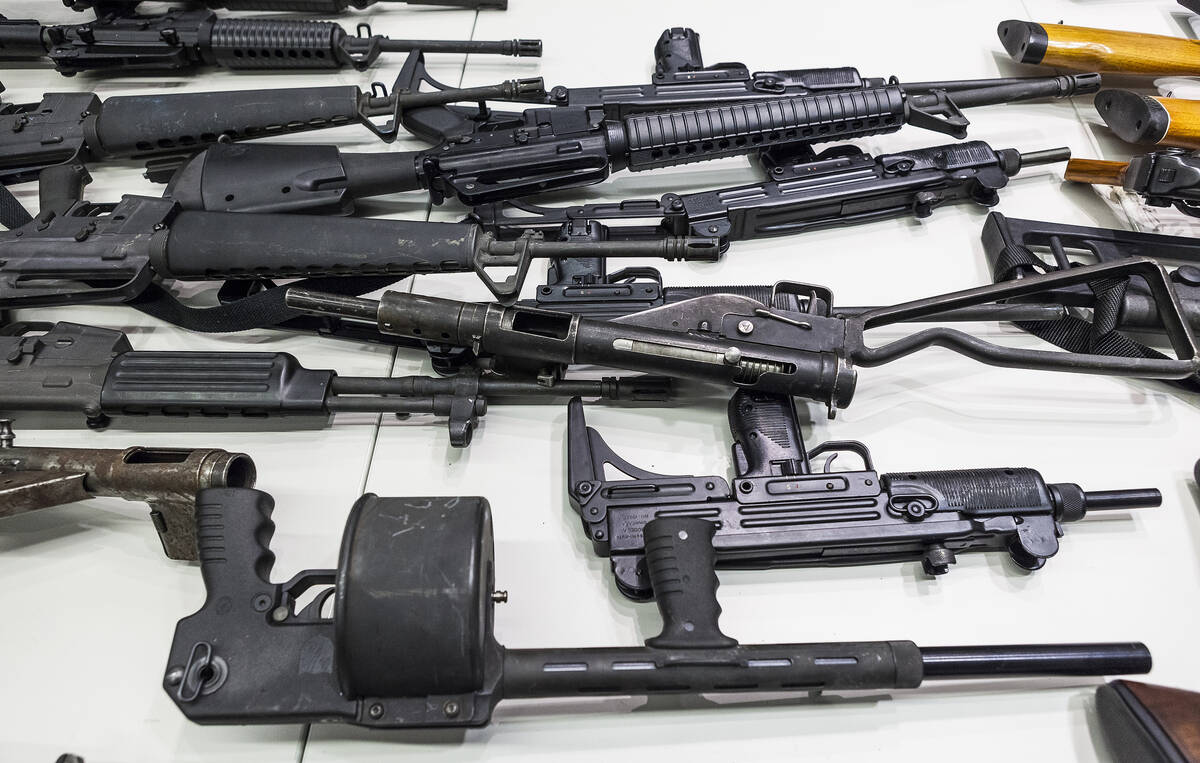 FILE - In this Dec. 27, 2012, file photo are some of the weapons that include handguns, rifles, ...