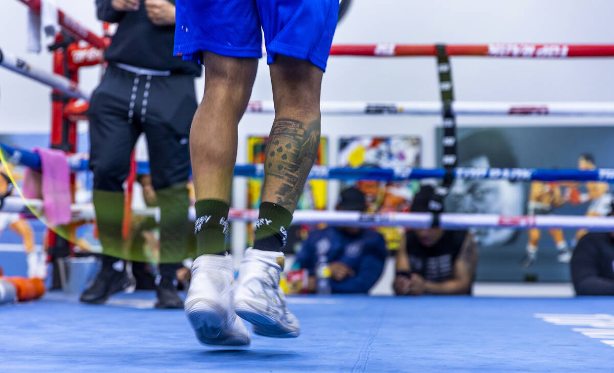 WBC lightweight boxer Devin Haney jumps rope in the ring during a workout session at the Top Ra ...