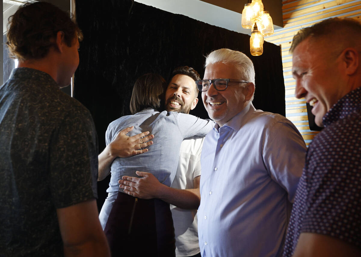 Jerad Howard of Dinette Luncheonette hugs Mallory Gott of Winnie & Ethel Downtown Diner, Th ...