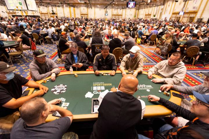 People participate during the World Series of Poker "Housewarming" event at Paris Las ...