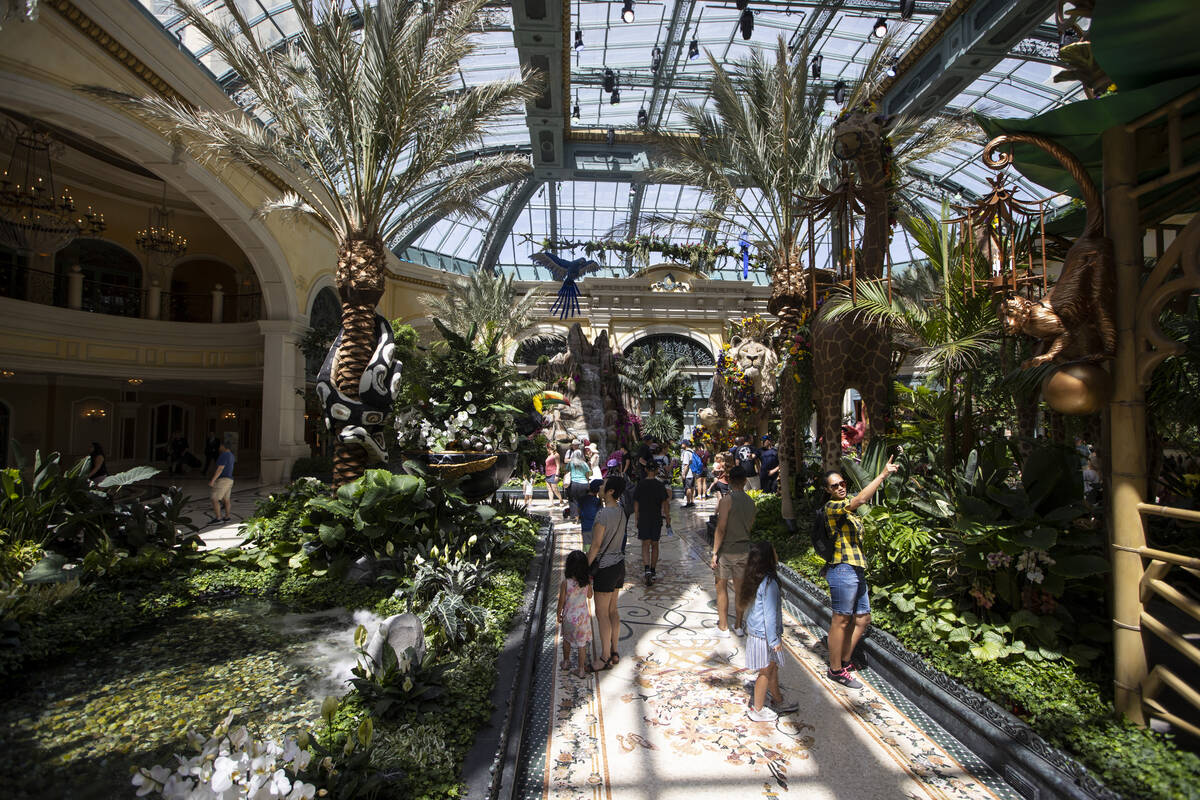 People visit the Bellagio’s Conservatory & Botanical Gardens in Las Vegas, Thursday, June 2, ...