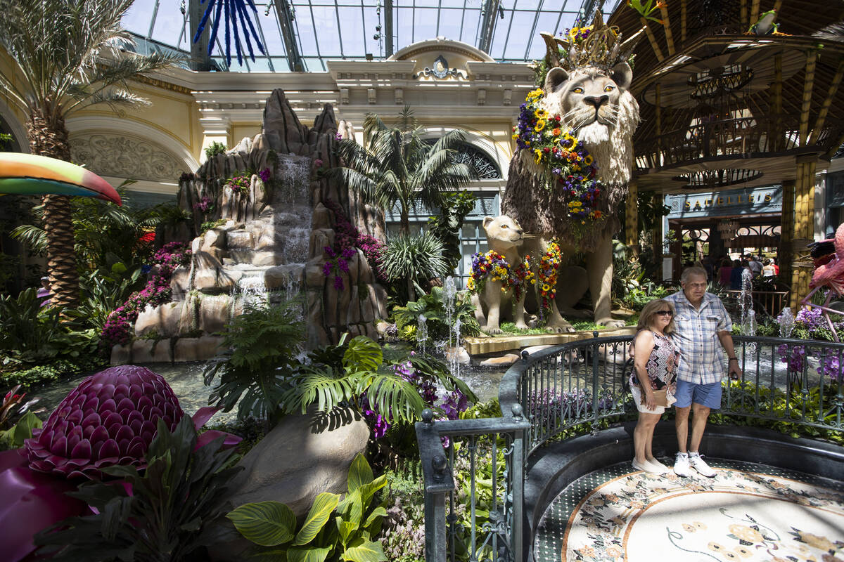 People visit the Bellagio’s Conservatory & Botanical Gardens in Las Vegas, Thursday, June 2, ...