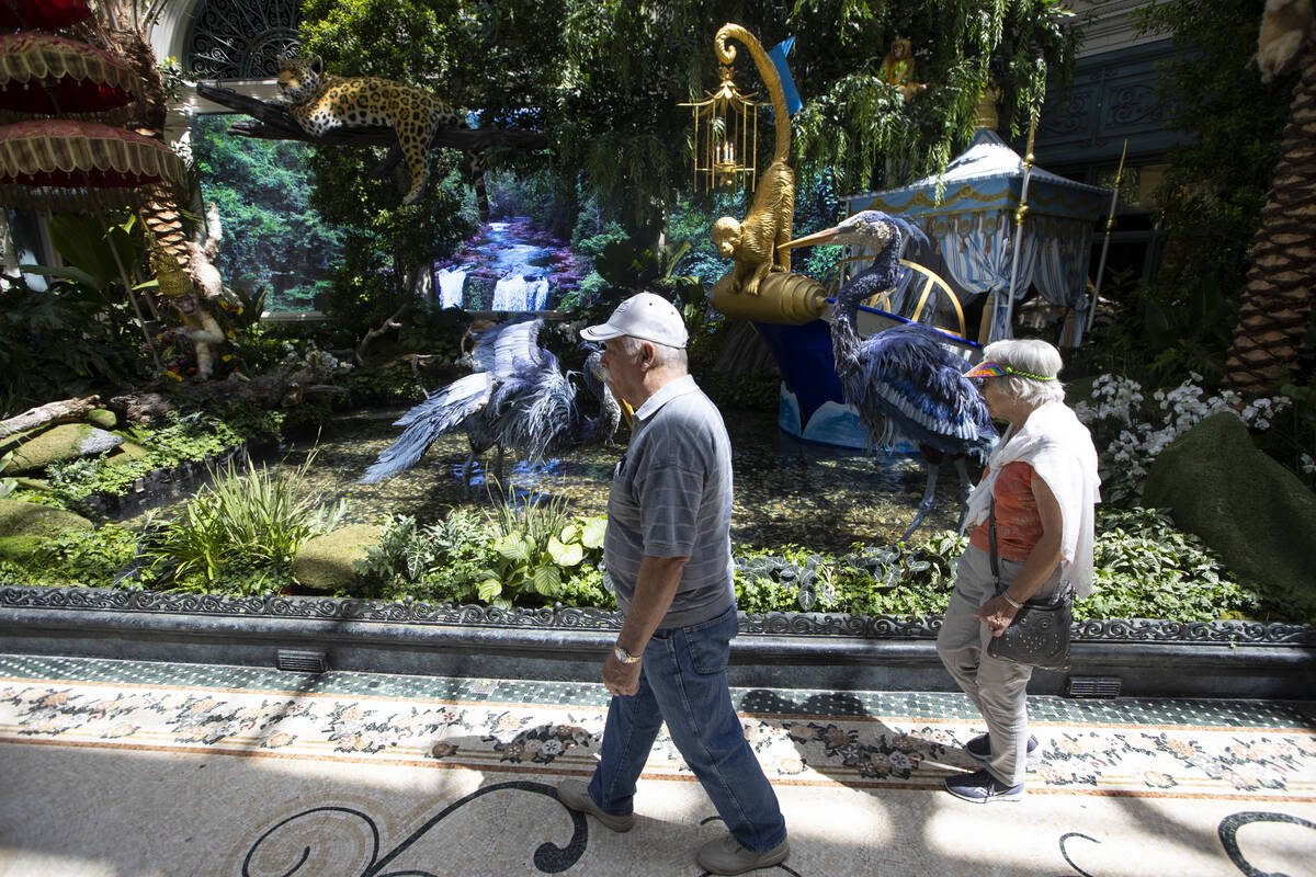 People visit the Bellagio’s Conservatory & Botanical Gardens in Las Vegas, Thursday, June 2, ...