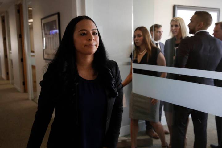 Former Olympic gymnast Tasha Schwikert leaves a conference room after speaking to reporters Mon ...