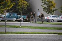 Troopers from the Iowa State Patrol stand outside Cornerstone Church after a shooting on Thursd ...