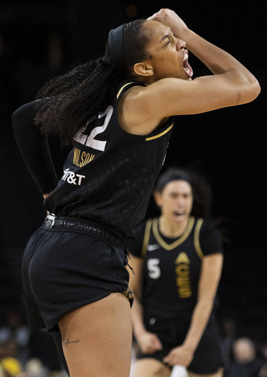 Aces forward A'ja Wilson (22) celebrates a big offensive play in the second half during a WNBA ...