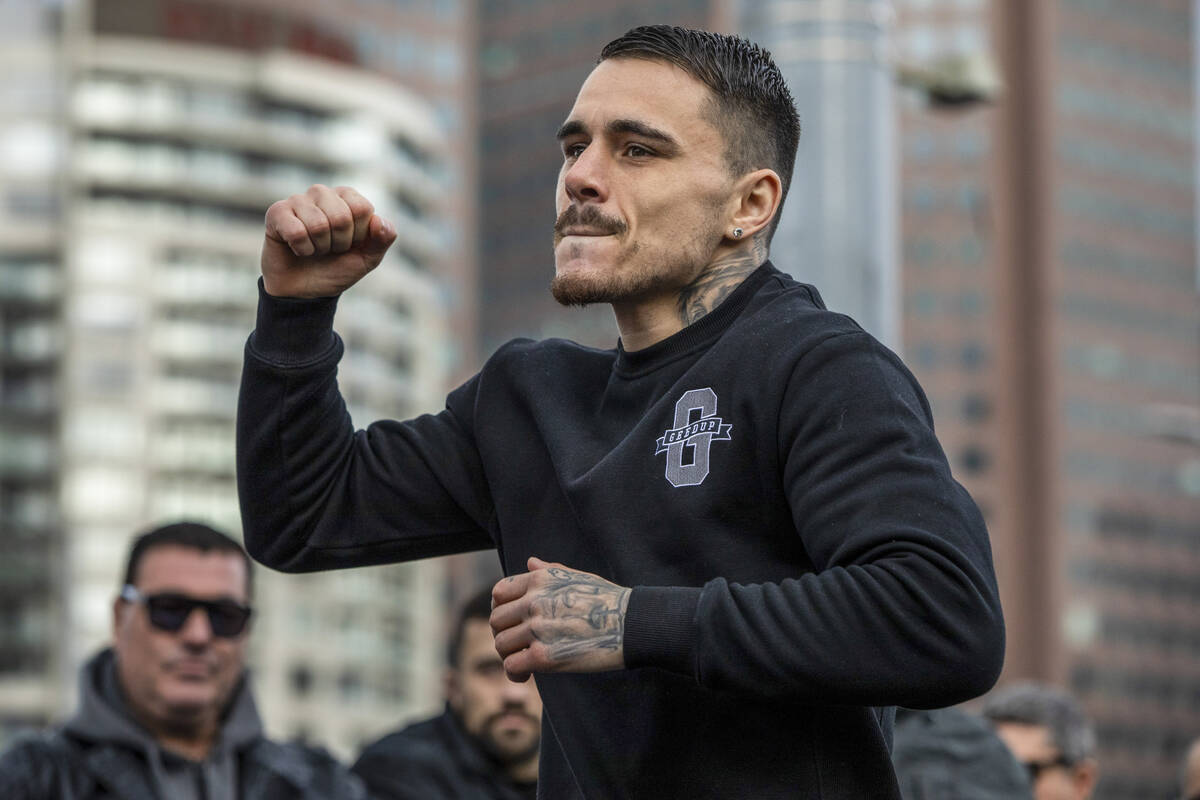 Australian boxer George Kambosos gestures during a public training session at Federation Square ...