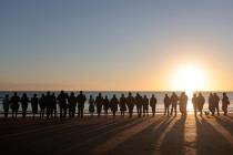 World War II reenactors gather on Omaha Beach in Saint-Laurent-sur-Mer, Normandy, France M ...