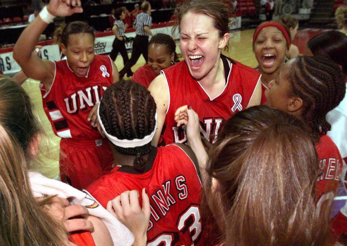 UNLV senior forward Linda Frohlich (13), center, celebrates with her teammates after the Lady R ...