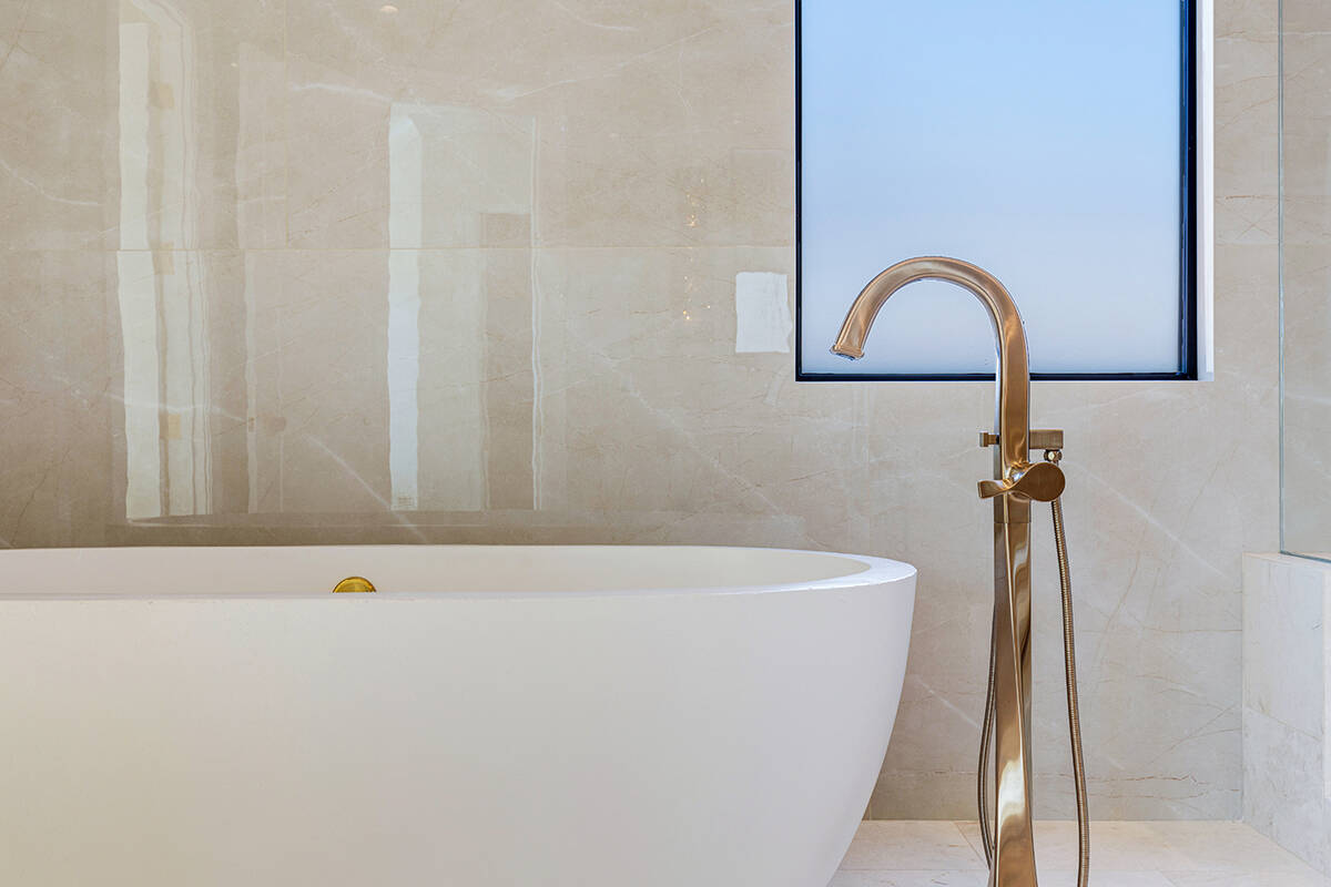 The soaking tub in the master bath. (Ivan Sher Group)