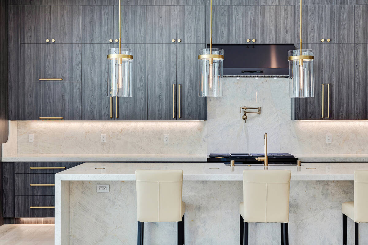 Ivan Sher Group Striking white Cristallo quartzite counters contrast the stylish gourmet kitche ...