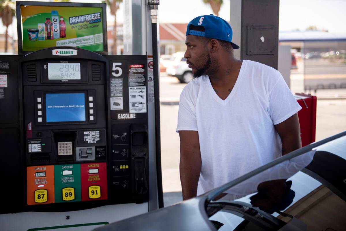 Jay Money pumps gas at a 7-Eleven station on East Lake Mead Blvd. on Monday, June 6, 2022, in N ...