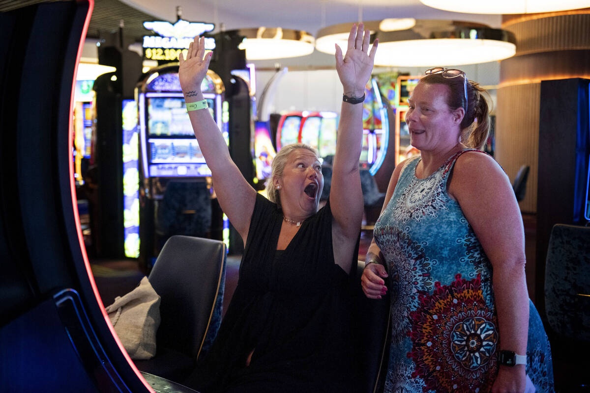 Chastity Irwin, left, and Kaycee Goings, of Dayton, Ohio, play the slot machines at Circa on Th ...