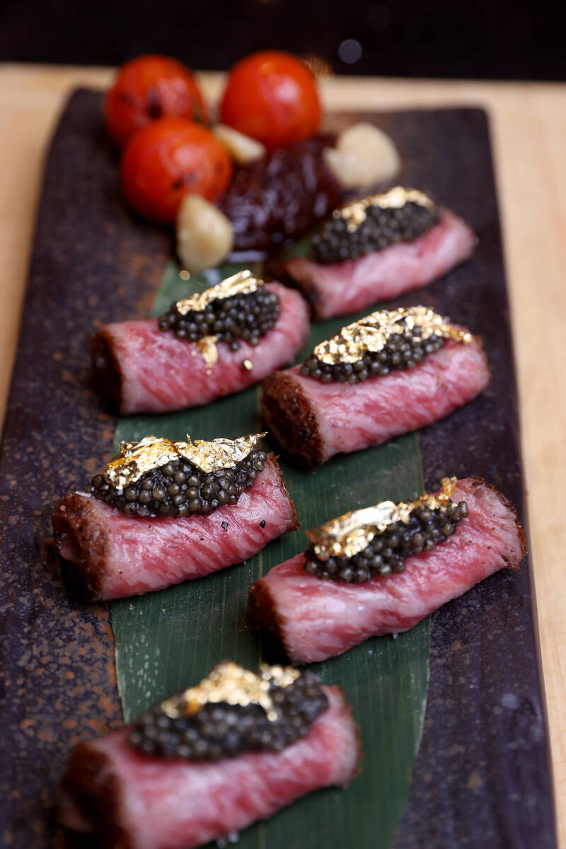 Bites fashioned from A5 grade wagyu beef, osetra caviar, truffle sauce and gold leaf by executi ...